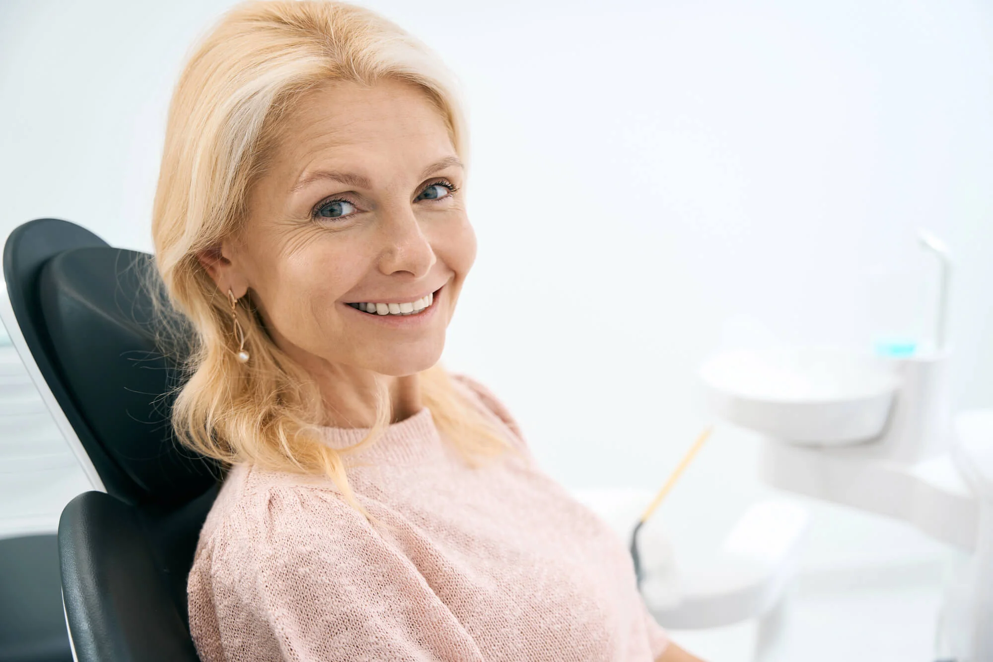 Dental bridge supported by implants illustration, Crowns in Seneca